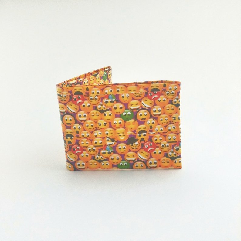 small yellow bi-fold wallet created with emoji print duct tape