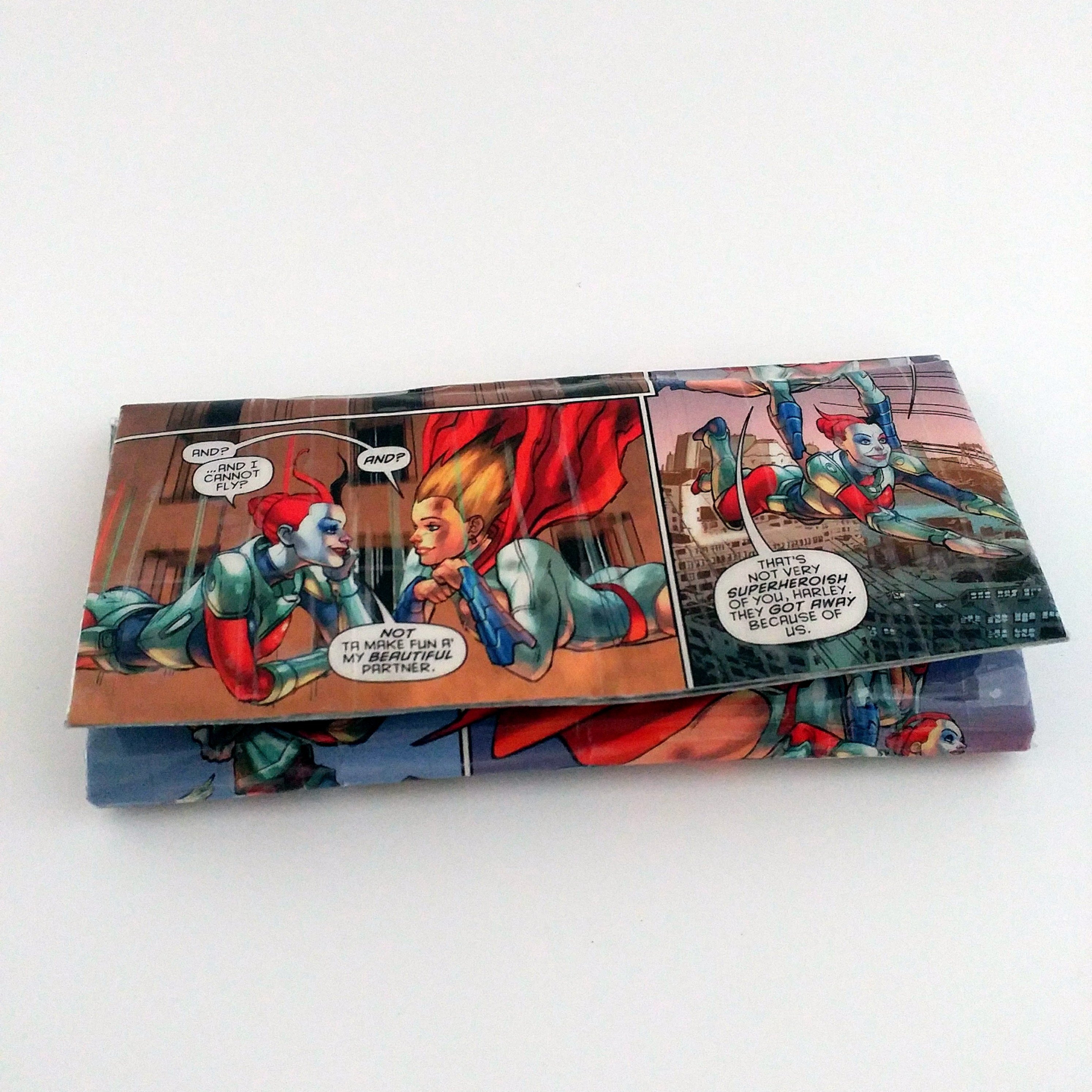 Harley Quinn and Power Girl wallet made from an upcycled Harley Quinn comic book.