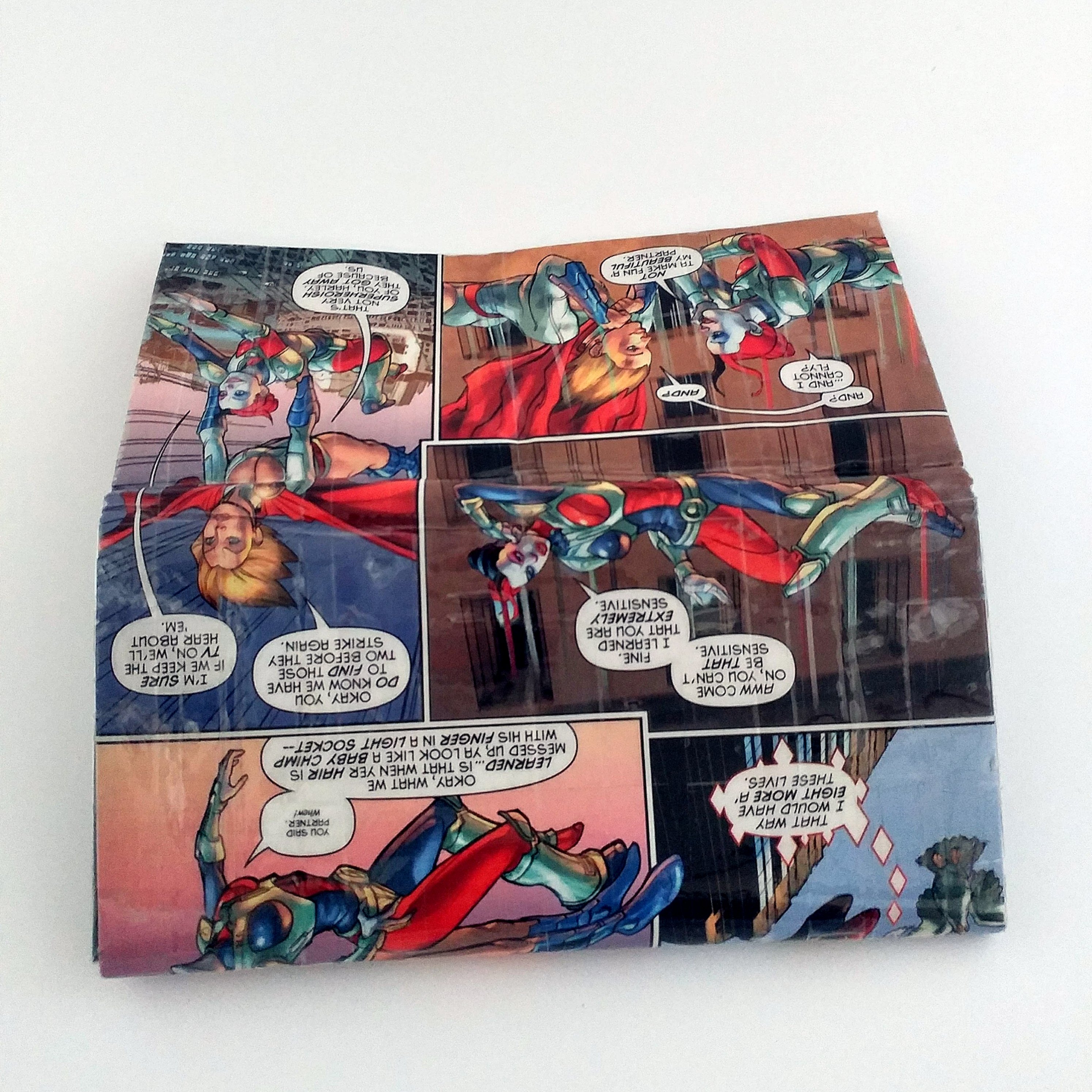Harley Quinn and Power Girl wallet made from an upcycled Harley Quinn comic book.